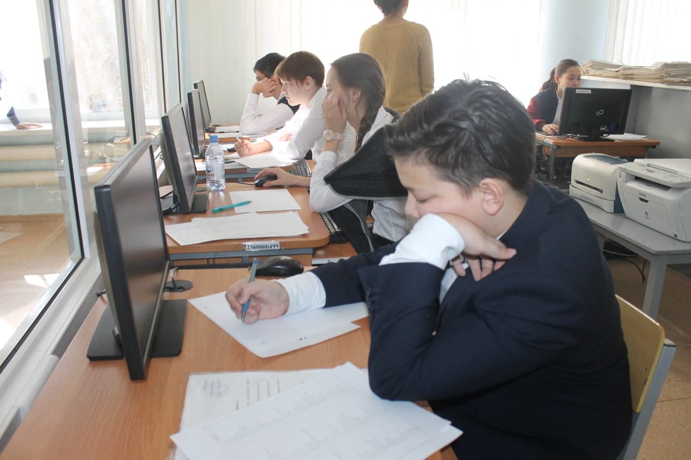 A student focused on their work during a lesson